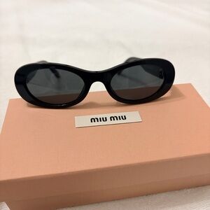 Miu Miu Sunglasses SMU06Z